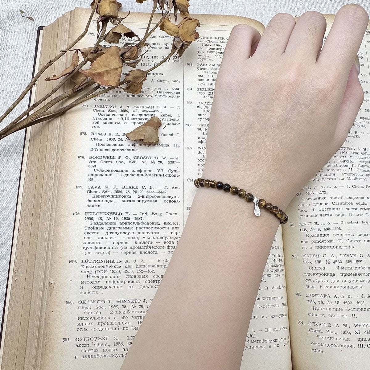 4mm tiger's eye bracelet on the hand