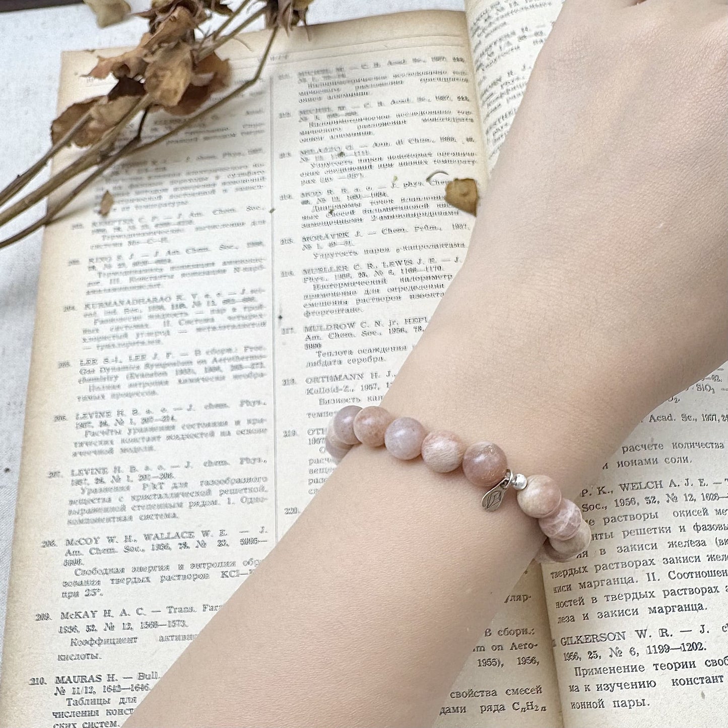 8mm rainbow moonstone crystal bracelet on the hand