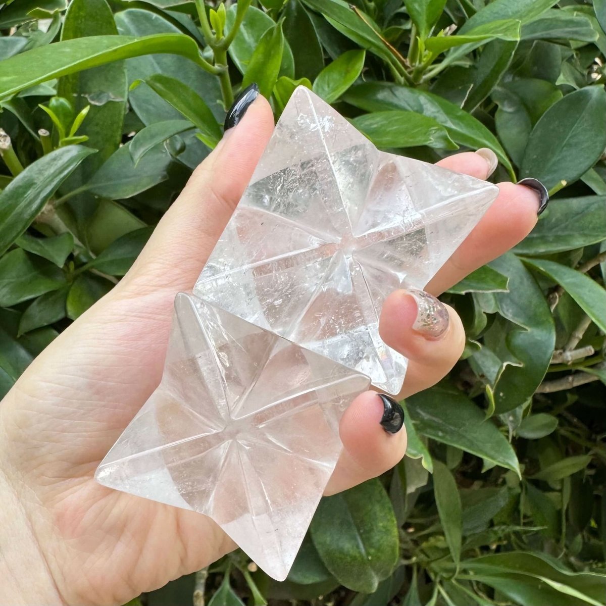 Clear Crystal Merkaba of two sizes