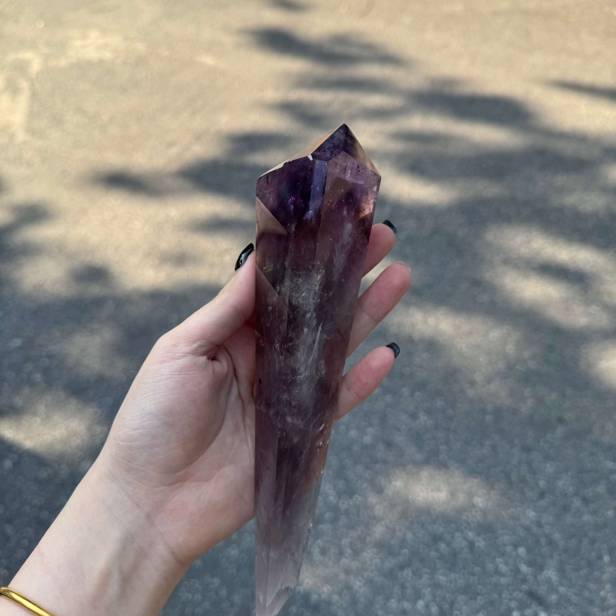 Polished Amethyst Scepter under sunshine