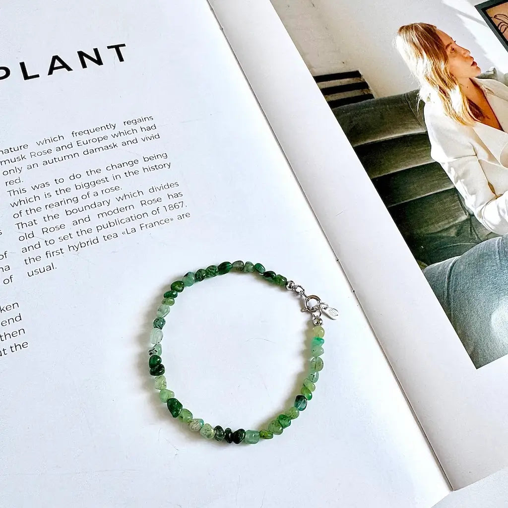 Emerald crystal bracelet showing natural raw green emerald stone bead structure and texture