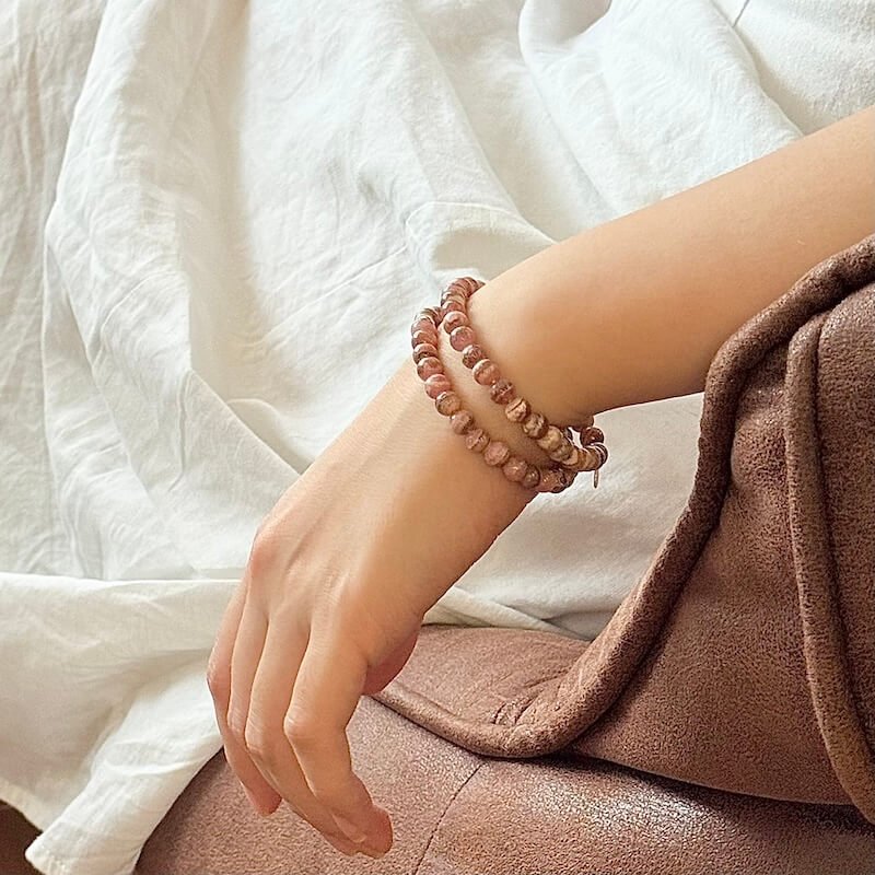 Rhodochrisite_Bracelet_6mm on the hand