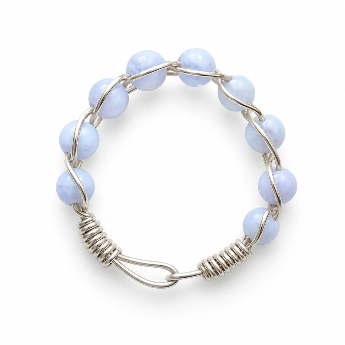 Pale blue lace agate beaded wire-wrapped ring on a white background