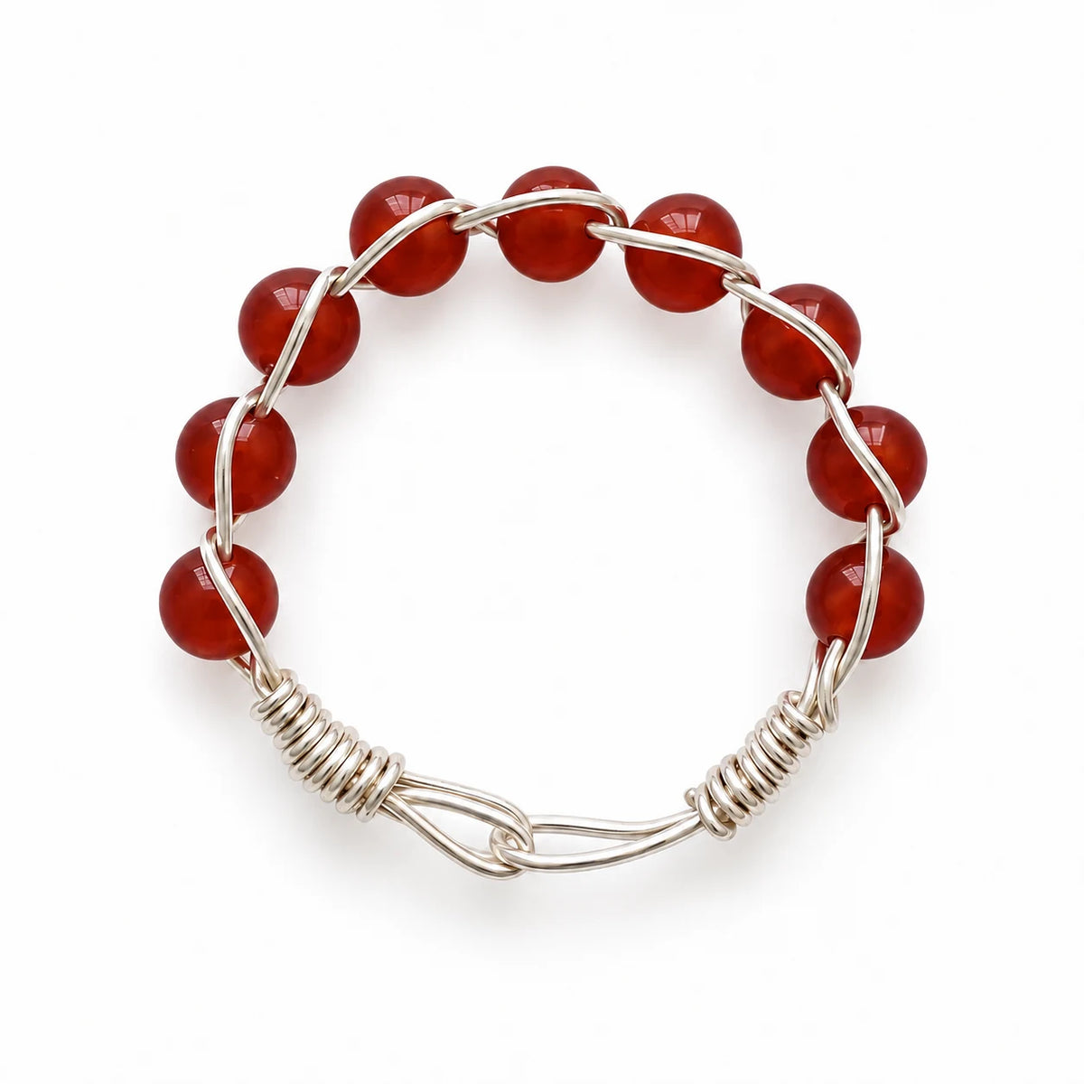 Warm brick-red carnelian beaded wire-wrapped ring on a white background