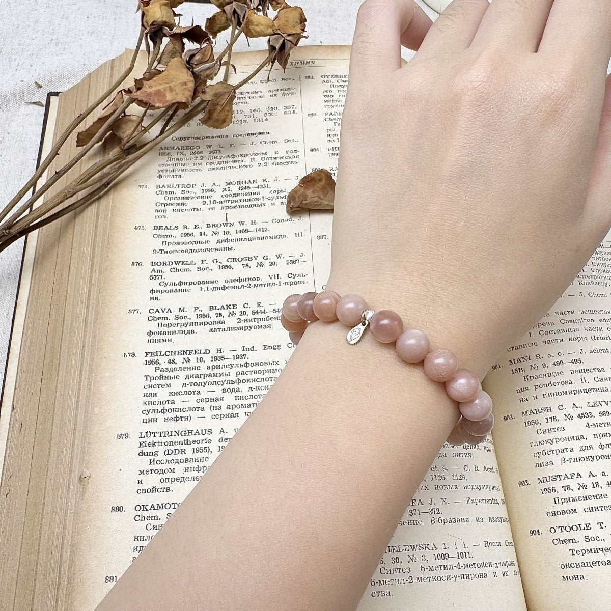 sunstone crystal bracelet on the hand