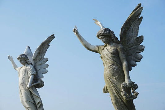 Close-up of angel statues illustrating the symbolism of Angel Number 1616