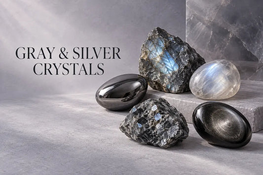 Gray and silver crystals including hematite, labradorite, moonstone, larvikite and silver sheen obsidian