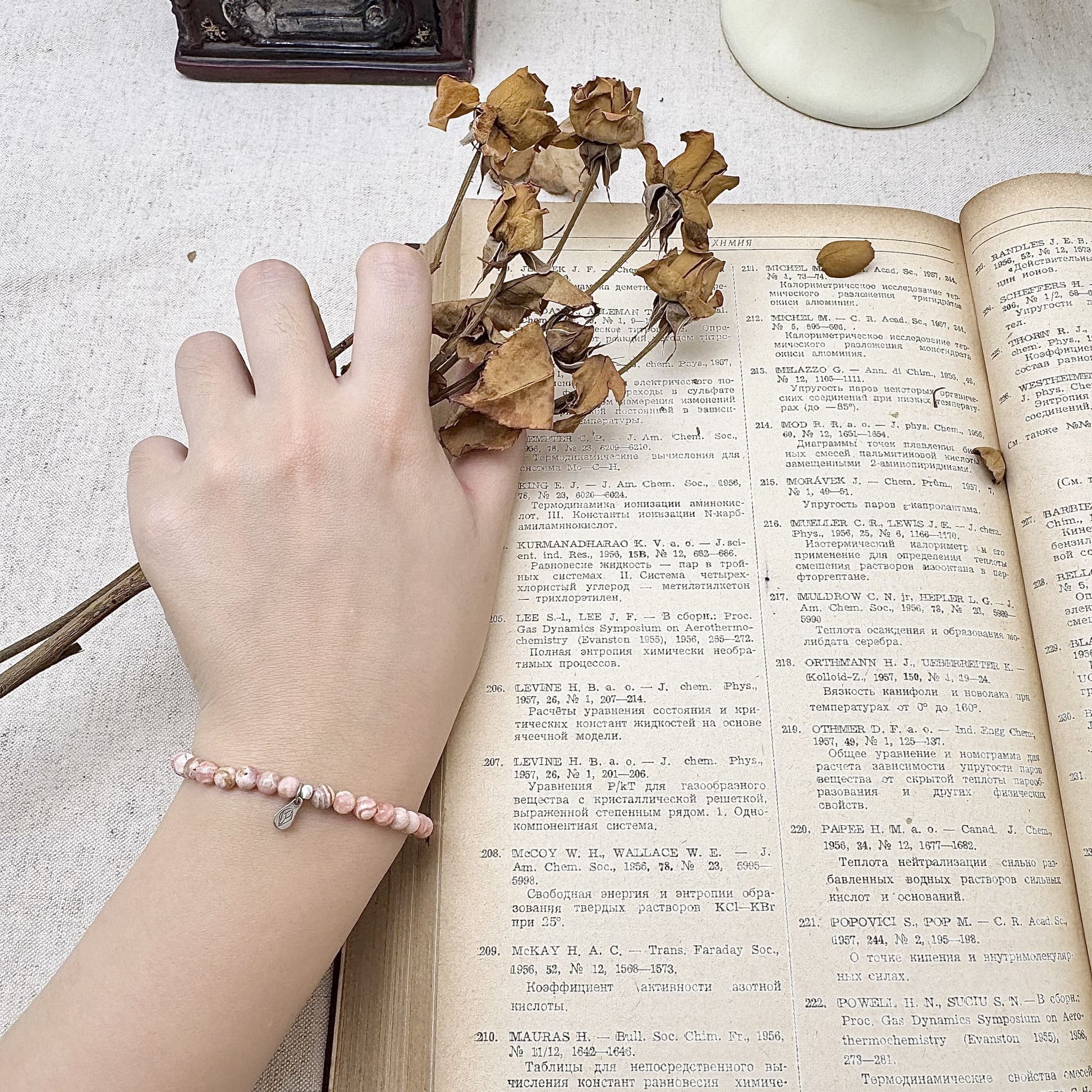 4mm rhodochrosite crystal bracelet on the hand