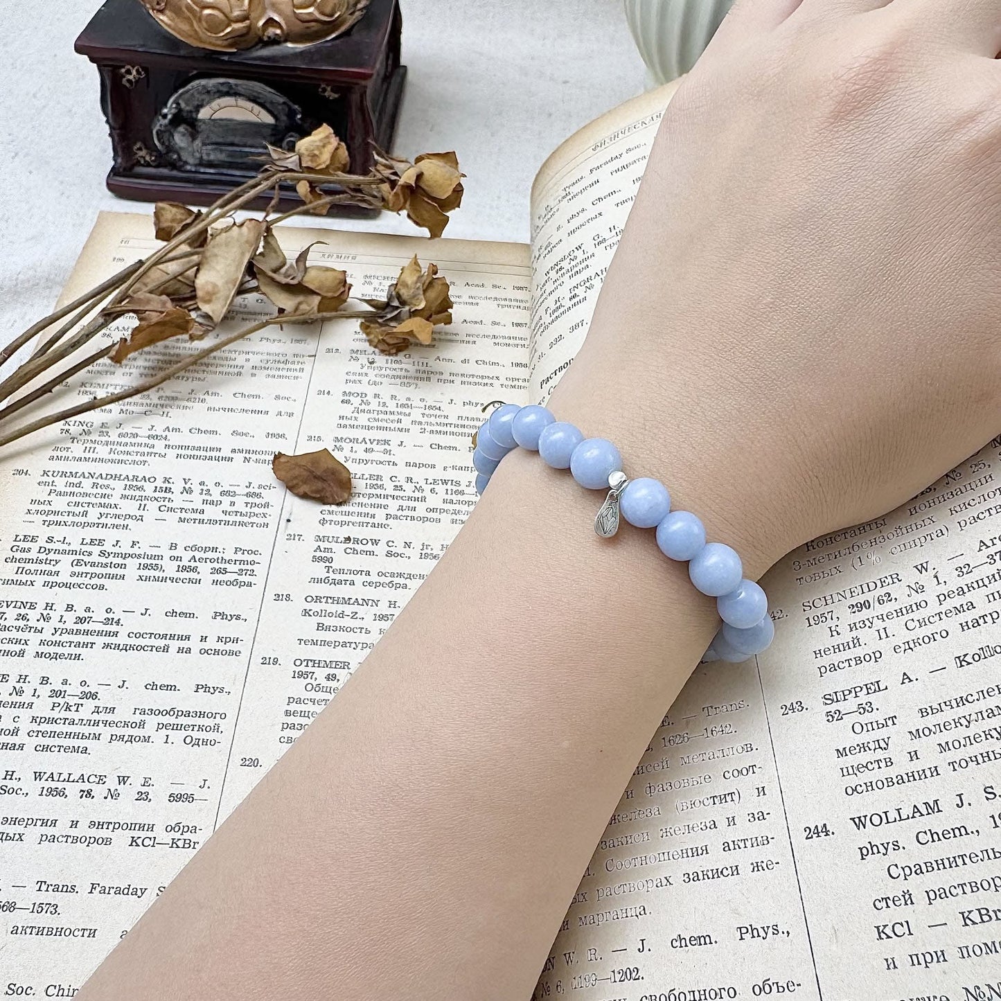 8mm angelite bracelet on the hand
