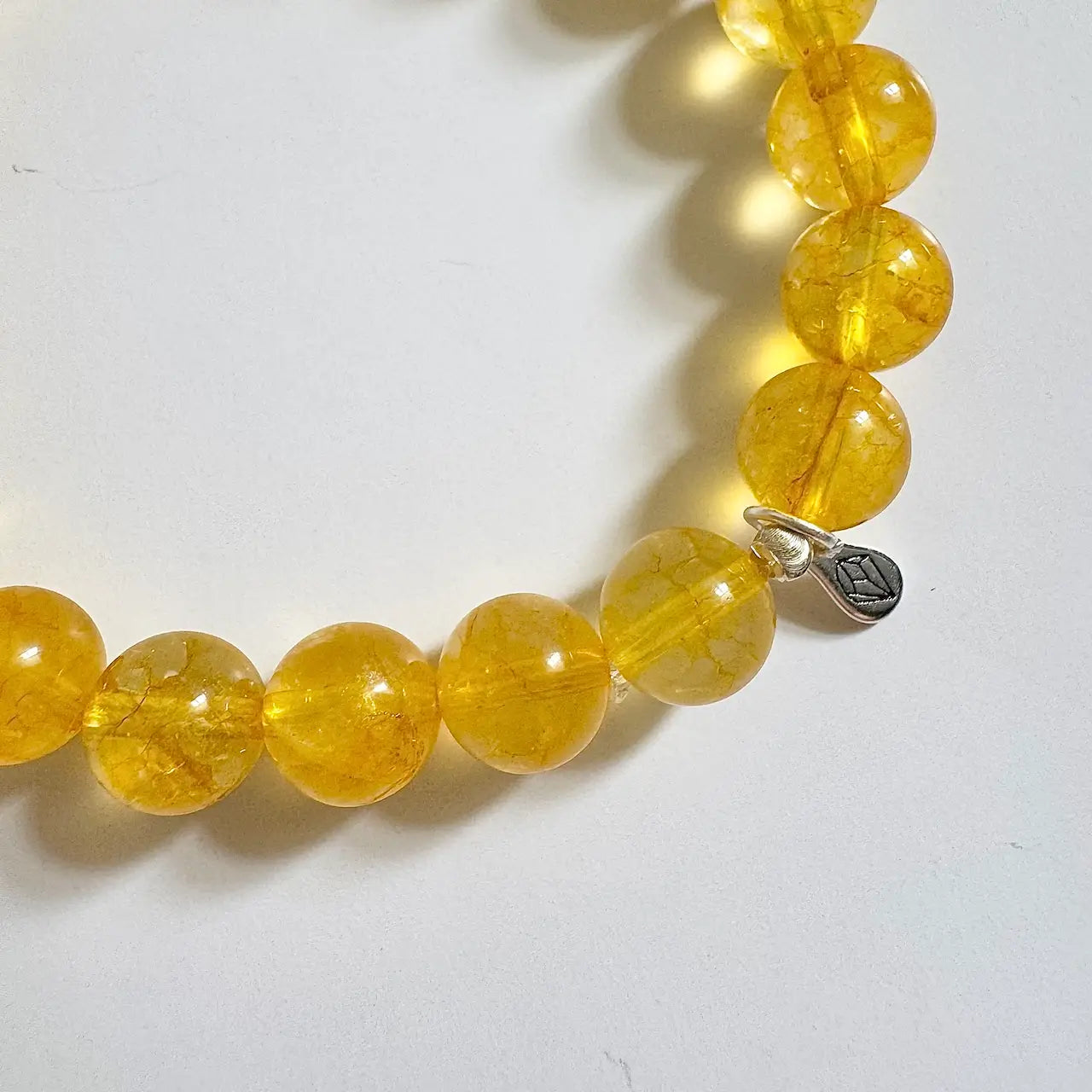 Citrine crystal bracelet with golden yellow beads