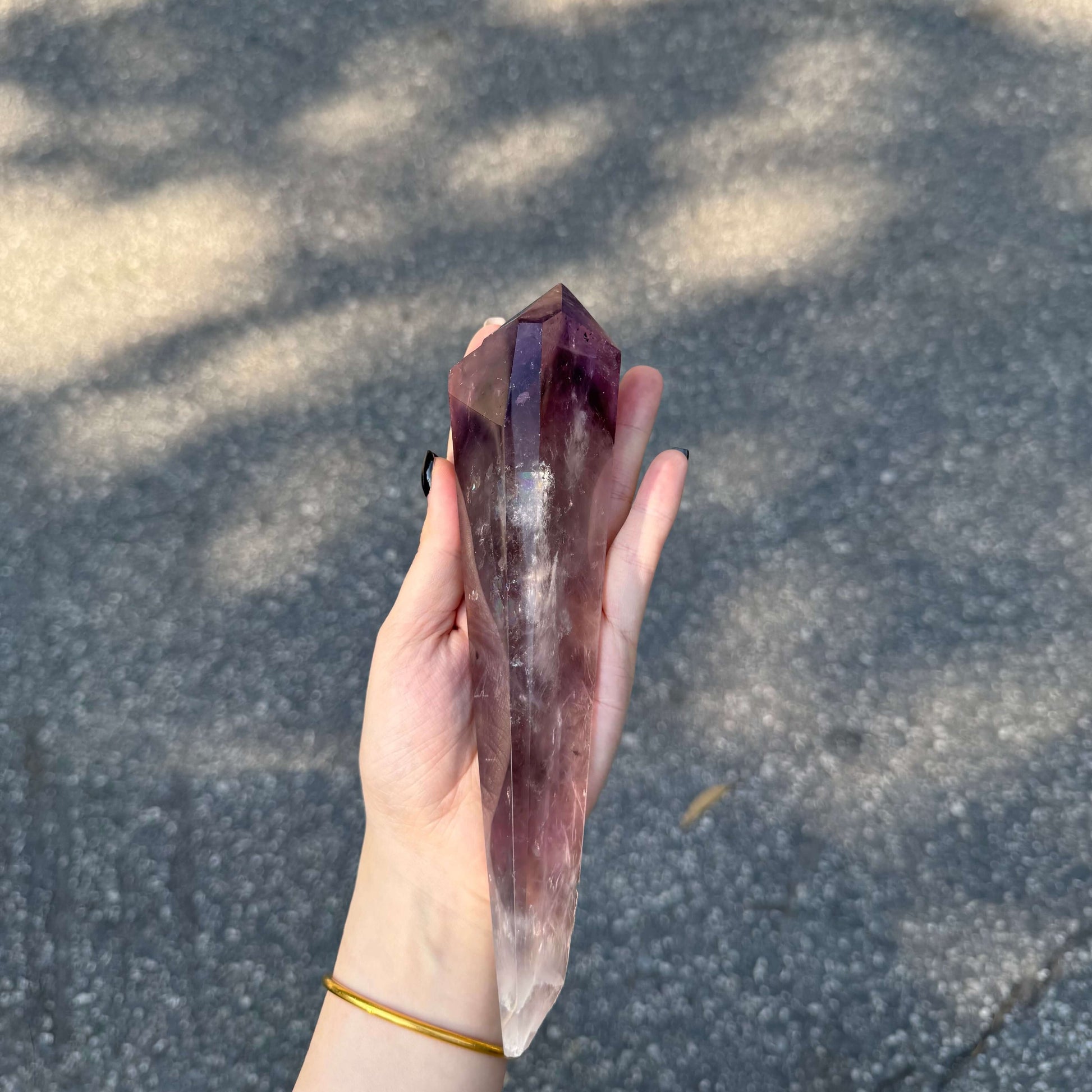 Purple Polished Amethyst Scepter held in hand