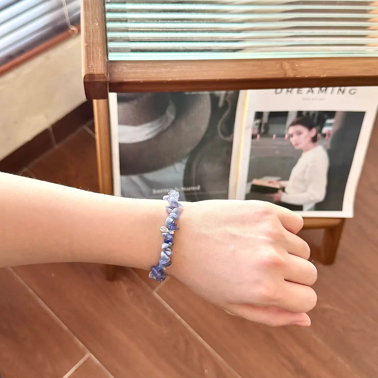 Tanzanite crystal bracelet worn on wrist close-up featuring 8mm natural gemstone chip beads