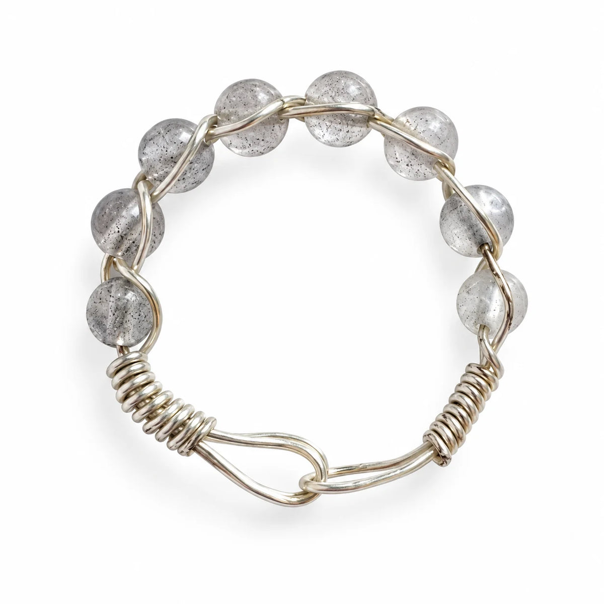 Translucent gray beaded wire-wrapped ring on a white background